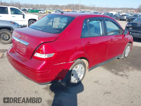 2011 Nissan Versa 1.8 S with VIN 3N1BC1AP2BL360106, listed as a IAAI auction lot 41667730 with 210,848 mi miles. Bid and sale history available at carsss.com. Image 4.