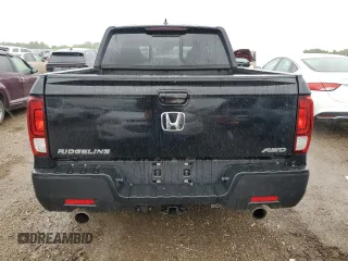 2023 Honda Ridgeline RTL with VIN 5FPYK3F59PB001216, listed as a Copart auction lot 57147385 with 43,452 mi miles and Salvage title. Bid and sale history available at DreamBid. Image 6.