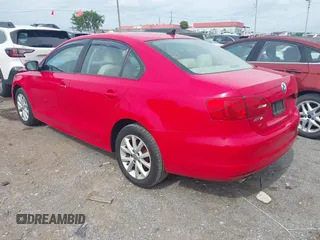 2012 Volkswagen Jetta SE with VIN 3VWDX7AJ0CM322455, listed as a IAAI auction lot 42279027 with 121,214 mi miles and . Bid and sale history available at DreamBid. Image 3.