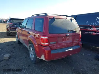 2009 Ford Escape XLT with VIN 1FMCU93G09KB76882, listed as a IAAI auction lot 41810579 with 167,584 mi miles. Bid and sale history available at carsss.com. Image 3.