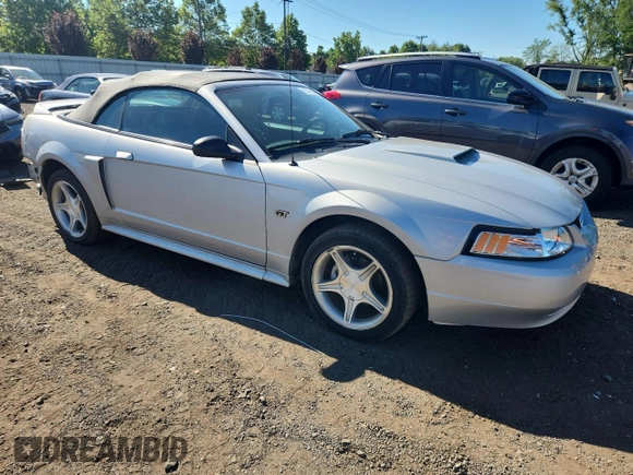 2000 Ford Mustang GT with VIN 1FAFP45X7YF265824, listed as a Copart auction lot 65204825 with 69,117 mi miles and Salvage title. Bid and sale history available at DreamBid. Image 4.