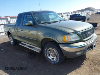 2002 Ford F-150 XL z VIN 2FTRX18W42CA61719, wystawiony jako IAAI lot #42146516 z przebiegiem 99 774 mil mil oraz . Historia ofert i sprzedaży dostępna na DreamBid. Obrazek 1.