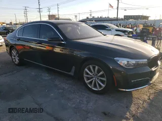 2016 BMW 7 Series 740i with VIN WBA7E2C59GG504533, listed as a Copart auction lot 77122283 with 68,209 mi miles. Bid and sale history available at carsss.com. Image 4.