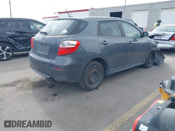 2009 Toyota Matrix with VIN 2T1KU40E79C163666, listed as a IAAI auction lot 41708972 with 182,808 mi miles and . Bid and sale history available at carsss.com. Image 4.