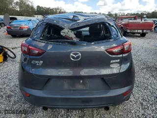 2017 Mazda CX-3 Sport with VIN JM1DKFB70H0175238, listed as a Copart auction lot 74474364 with 77,024 mi miles and Salvage Title. Bid and sale history available at carsss.com. Image 6.