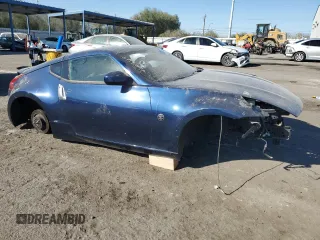 2014 Nissan 370Z Touring with VIN JN1AZ4EH6EM633394, listed as a Copart auction lot 74360354 with 0 mi miles and Salvage Title. Bid and sale history available at carsss.com. Image 4.