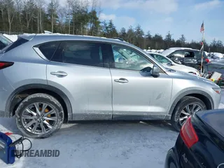 2021 Mazda CX-5 Grand Touring Reserve with VIN JM3KFBAY0M0377030, listed as a IAAI auction lot 41606709 with 39,590 mi miles. Bid and sale history available at carsss.com. Image 13.