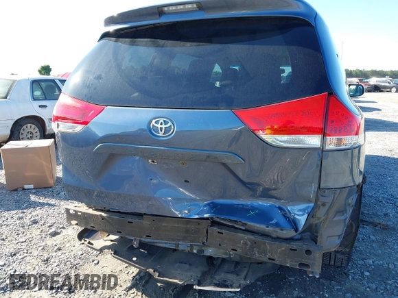 2014 Toyota Sienna XLE with VIN 5TDYK3DC9ES526117, listed as a IAAI auction lot 42247546 with 119,096 mi miles and . Bid and sale history available at DreamBid. Image 6.