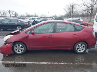 2005 Toyota Prius z VIN JTDKB20U257055663, wystawiony jako IAAI lot #41580381 z przebiegiem 123 032 mil mil oraz . Historia ofert i sprzedaży dostępna na DreamBid. Obrazek 14.