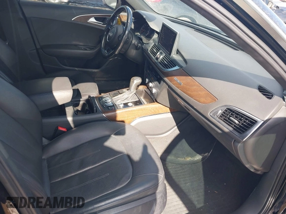 2016 Audi A6 Premium Plus z VIN WAUGFAFCXGN147215, wystawiony jako IAAI lot #41655394 z przebiegiem 143 357 mil mil oraz . Historia ofert i sprzedaży dostępna na DreamBid. Obrazek 5.