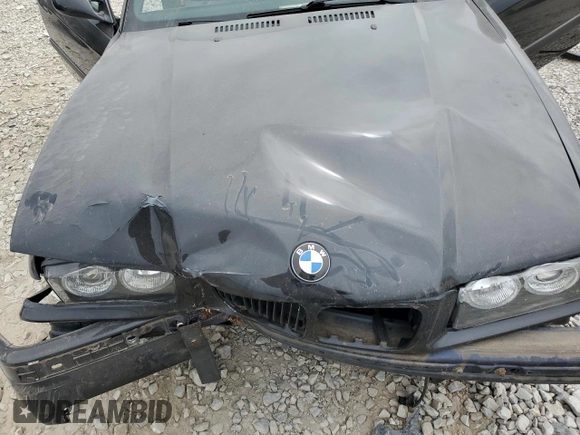 1999 BMW 3 Series M3 with VIN WBSBK0333XEC40421, listed as a Copart auction lot 71393194 with 104,293 mi miles and Salvage Title. Bid and sale history available at carsss.com. Image 11.