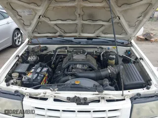 1998 Isuzu Rodeo S with VIN 4S2CM58W0W4331738, listed as a IAAI auction lot 42074562 with 237,684 mi miles. Bid and sale history available at carsss.com. Image 10.