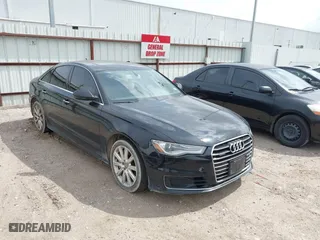 2016 Audi A6 2.0T Premium Plus with VIN WAUGFAFC1GN012799, listed as a IAAI auction lot 42141346 with 101,506 mi miles. Bid and sale history available at carsss.com. Image 1.
