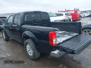 2014 Nissan Frontier SV with VIN 1N6AD0ER5EN746404, listed as a IAAI auction lot 41465263 with 113,465 mi miles and . Bid and sale history available at DreamBid. Image 3.