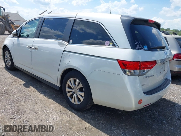 2014 Honda Odyssey EX-L with VIN 5FNRL5H69EB048867, listed as a IAAI auction lot 42190464 with 172,487 mi miles and . Bid and sale history available at carsss.com. Image 3.