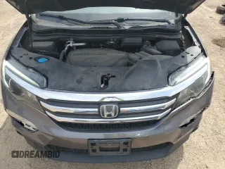 2017 Honda Pilot EX-L z VIN 5FNYF6H61HB061139, wystawiony jako Copart lot #55593095 z przebiegiem 107 170 mil mil oraz Szkoda całkowita • Salvage title. Historia ofert i sprzedaży dostępna na DreamBid. Obrazek 11.