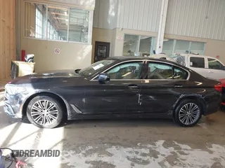 2018 BMW 5 Series 530i xDrive with VIN WBAJA7C55JWA73459, listed as a IAAI auction lot 41634921 with 64,759 mi miles and . Bid and sale history available at carsss.com. Image 14.
