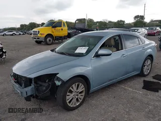2009 Mazda 6 i Touring with VIN 1YVHP82AX95M19535, listed as a IAAI auction lot 41987285 with 129,111 mi miles and . Bid and sale history available at carsss.com. Image 18.