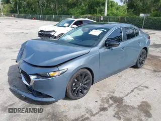 2024 Mazda 3 S Carbon Edition with VIN 3MZBPBCM2RM403824, listed as a IAAI auction lot 42612315 with 8,261 mi miles and . Bid and sale history available at DreamBid. Image 18.