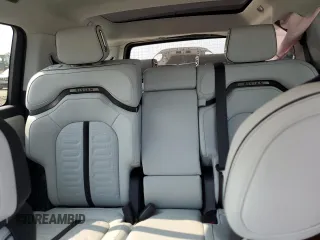 2024 Rivian R1S Adventure z VIN 7PDSGBBA0RN038679, wystawiony jako Copart lot #66486464 z przebiegiem Nie podano mil oraz Szkody całkowita. Historia ofert i sprzedaży dostępna na DreamBid. Obrazek 10.