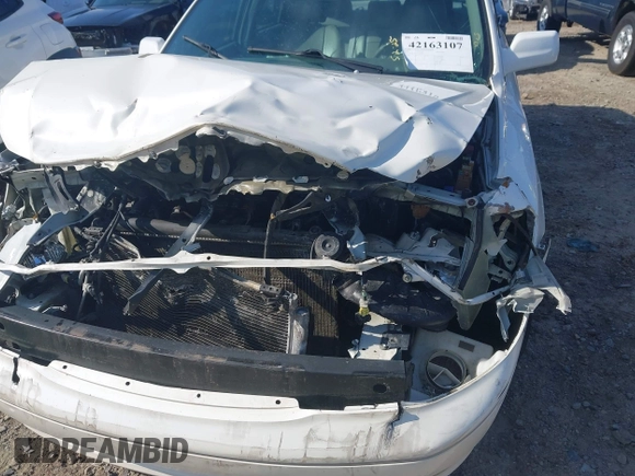 2004 Toyota Avalon XL z VIN 4T1BF28BX4U343188, wystawiony jako IAAI lot #42163107 z przebiegiem Nie podano mil oraz . Historia ofert i sprzedaży dostępna na DreamBid. Obrazek 17.