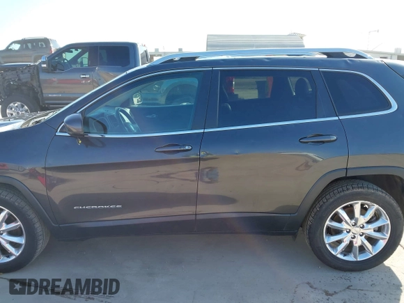 2016 Jeep Cherokee Limited with VIN 1C4PJLDS7GW159825, listed as a IAAI auction lot 41951609 with 102,624 mi miles and . Bid and sale history available at DreamBid. Image 14.