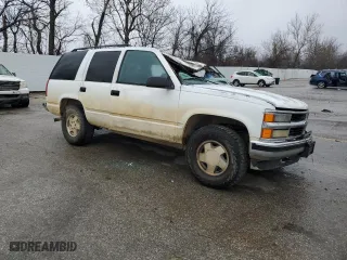 1998 Chevrolet Tahoe with VIN 1GNEK13R4WJ346191, listed as a Copart auction lot 86583514 with 2,650,816 mi miles and Salvage Title. Bid and sale history available at carsss.com. Image 4.
