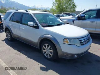 2008 Ford Taurus X SEL with VIN 1FMDK05W98GA41945, listed as a IAAI auction lot 42067959 with 157,896 mi miles and . Bid and sale history available at DreamBid. Image 1.