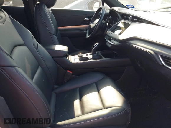 2022 Cadillac XT4 FWD Premium Luxury с VIN 1GYFZCR48NF138181, выставлен на аукционе IAAI как лот 42187527 с пробегом Не указан миль и . История ставок и продаж доступна на DreamBid. Изображение 5.