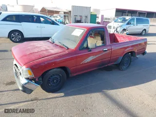 1993 Toyota 2WD Pickups DX with VIN JT4RN81P1P5162011, listed as a IAAI auction lot 41721589 with 207,489 mi miles. Bid and sale history available at carsss.com. Image 2.