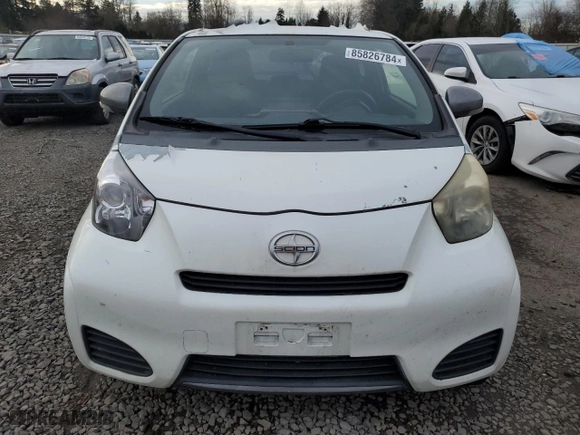 2012 Scion iQ with VIN JTNJJXB0XCJ018779, listed as a Copart auction lot 85826784 with 49,057 mi miles and Clean Title. Bid and sale history available at carsss.com. Image 5.