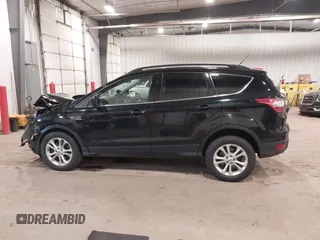 2017 Ford Escape SE with VIN 1FMCU9G98HUD67920, listed as a IAAI auction lot 40937291 with 124,302 mi miles. Bid and sale history available at carsss.com. Image 14.