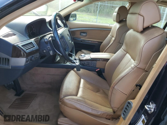 2005 BMW 7 Series 745i with VIN WBAGL63545DP75494, listed as a Copart auction lot 72359904 with 143,878 mi miles and Salvage title. Bid and sale history available at DreamBid. Image 7.