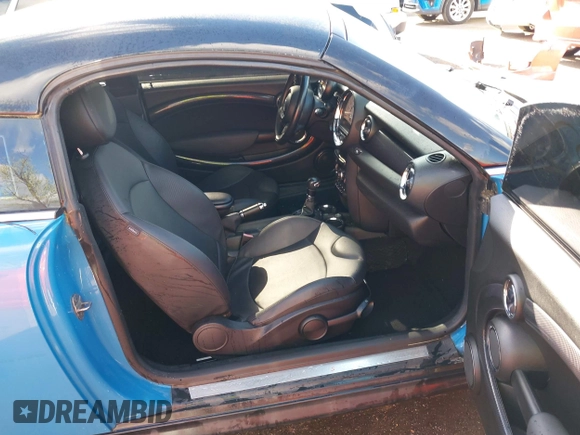 2013 MINI Coupe S with VIN WMWSX3C55DT466604, listed as a IAAI auction lot 42033723 with 109,814 mi miles and . Bid and sale history available at DreamBid. Image 5.