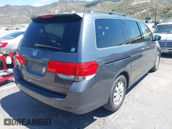 2010 Honda Odyssey EX-L with VIN 5FNRL3H68AB011324, listed as a IAAI auction lot 42113668 with 142,988 mi miles and . Bid and sale history available at DreamBid. Image 4.