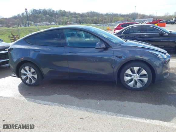 2023 Tesla Model Y Long Range with VIN 7SAYGDEE3PA204992, listed as a IAAI auction lot 41849104 with 22,490 mi miles. Bid and sale history available at carsss.com. Image 13.