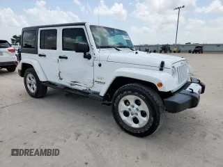 2014 Jeep Wrangler Unlimited Sahara with VIN 1C4BJWEG5EL309502, listed as a Copart auction lot 61804885 with 60,683 mi miles and Salvage title. Bid and sale history available at DreamBid. Image 4.
