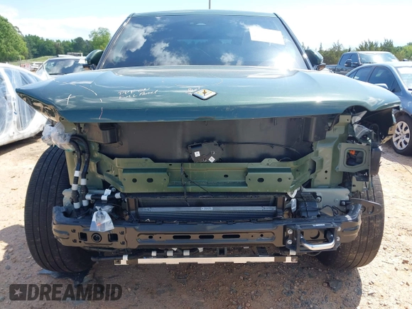 2023 Rivian R1T Adventure z VIN 7FCTGAAAXPN019894, wystawiony jako IAAI lot #42168226 z przebiegiem 23 380 mil mil oraz . Historia ofert i sprzedaży dostępna na DreamBid. Obrazek 6.