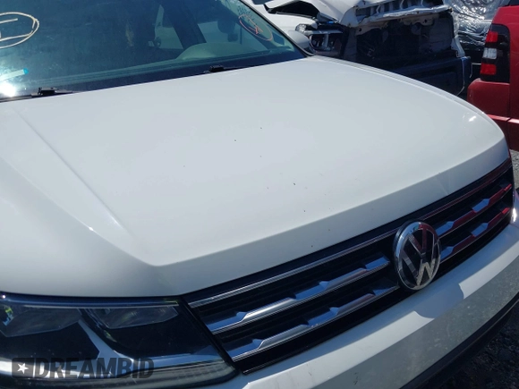 2020 Volkswagen Tiguan S z VIN 3VV1B7AX5LM010741, wystawiony jako IAAI lot #42030616 z przebiegiem 104 533 mil mil oraz . Historia ofert i sprzedaży dostępna na DreamBid. Obrazek 6.