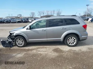 2017 Dodge Journey SXT z VIN 3C4PDDBG6HT595309, wystawiony jako IAAI lot #41918029 z przebiegiem 127 247 mil mil oraz . Historia ofert i sprzedaży dostępna na DreamBid. Obrazek 14.