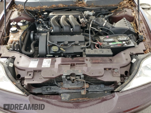 2000 Mercury Sable LS Premium z VIN 1MEFM59S1YA600756, wystawiony jako Copart lot #78743334 z przebiegiem 163 595 mil mil oraz Szkody całkowita. Historia ofert i sprzedaży dostępna na DreamBid. Obrazek 11.
