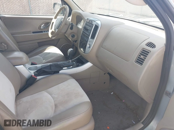 2006 Mercury Mariner Luxury с VIN 4M2CU57196KJ13921, выставлен на аукционе IAAI как лот 42087744 с пробегом 183 899 миль миль и . История ставок и продаж доступна на DreamBid. Изображение 5.