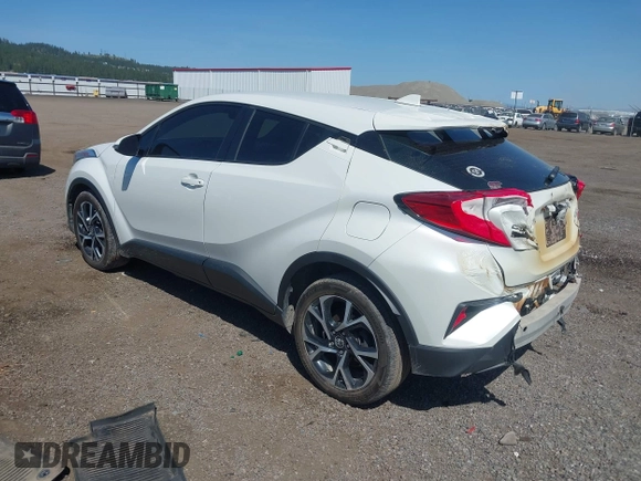 2018 Toyota C-HR XLE z VIN NMTKHMBXXJR041817, wystawiony jako IAAI lot #42174035 z przebiegiem 86 669 mil mil oraz . Historia ofert i sprzedaży dostępna na DreamBid. Obrazek 3.