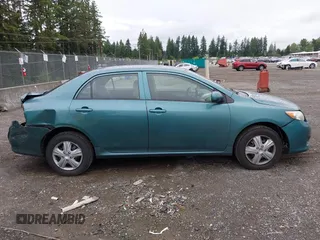 2010 Toyota Corolla with VIN 1NXBU4EE3AZ165944, listed as a IAAI auction lot 42597459 with 211,824 mi miles and . Bid and sale history available at DreamBid. Image 13.