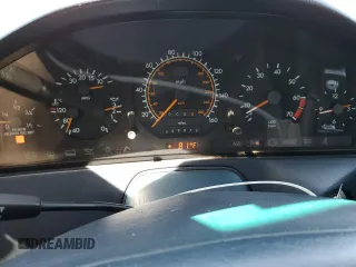 1992 Mercedes-Benz 500 z VIN WDBFA66E7NF049079, wystawiony jako Copart lot #52642285 z przebiegiem 69 976 mil mil oraz Szkody całkowita. Historia ofert i sprzedaży dostępna na DreamBid. Obrazek 9.