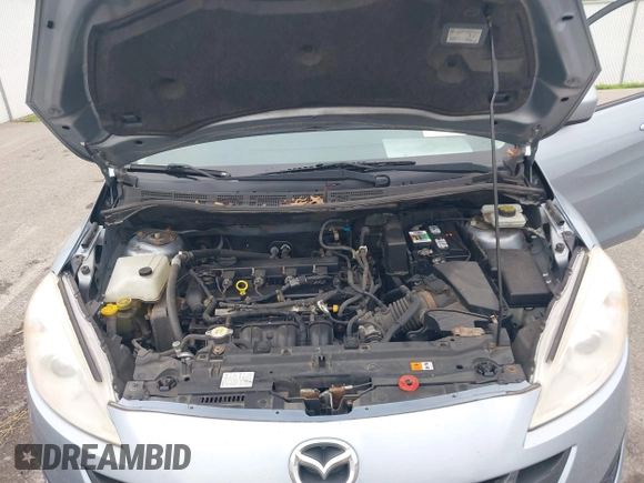 2012 Mazda 5 Touring with VIN JM1CW2CL7C0115096, listed as a IAAI auction lot 42524956 with 173,155 mi miles and . Bid and sale history available at DreamBid. Image 10.