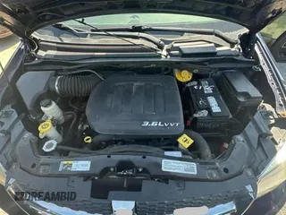 2014 Dodge Grand Caravan SXT with VIN 2C4RDGCG1ER308403, listed as a Copart auction lot 47603045 with 131,847 mi miles and Clean Title. Bid and sale history available at DreamBid. Image 7.