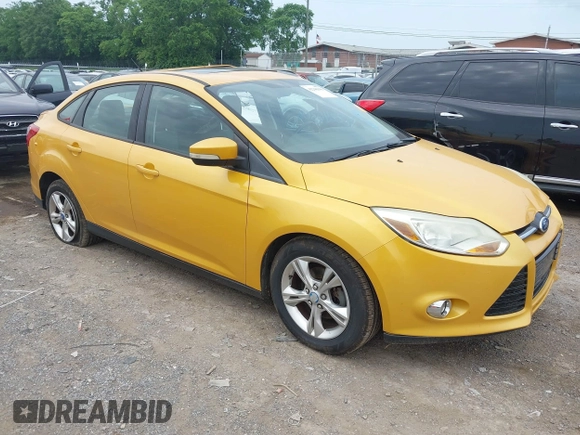 2012 Ford Focus SE with VIN 1FAHP3F2XCL220912, listed as a IAAI auction lot 42246306 with 99,162 mi miles and . Bid and sale history available at DreamBid. Image 1.