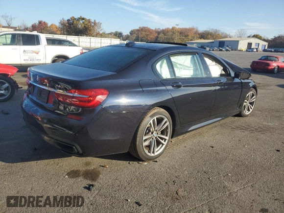 2018 BMW 7 Series 740i xDrive with VIN WBA7E4C53JGV23968, listed as a Copart auction lot 77244814 with 0 mi miles and Salvage Title. Bid and sale history available at carsss.com. Image 3.