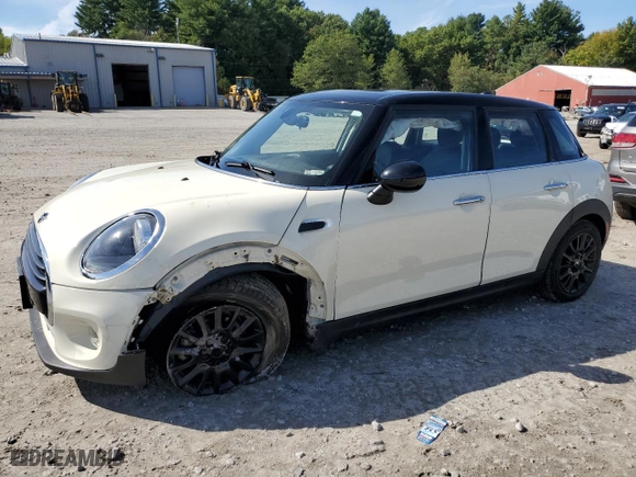 2019 MINI Hardtop 4 Door Cooper with VIN WMWXU1C56K2H74308, listed as a Copart auction lot 73110974 with 76,307 mi miles and Salvage Title. Bid and sale history available at carsss.com. Image 1.